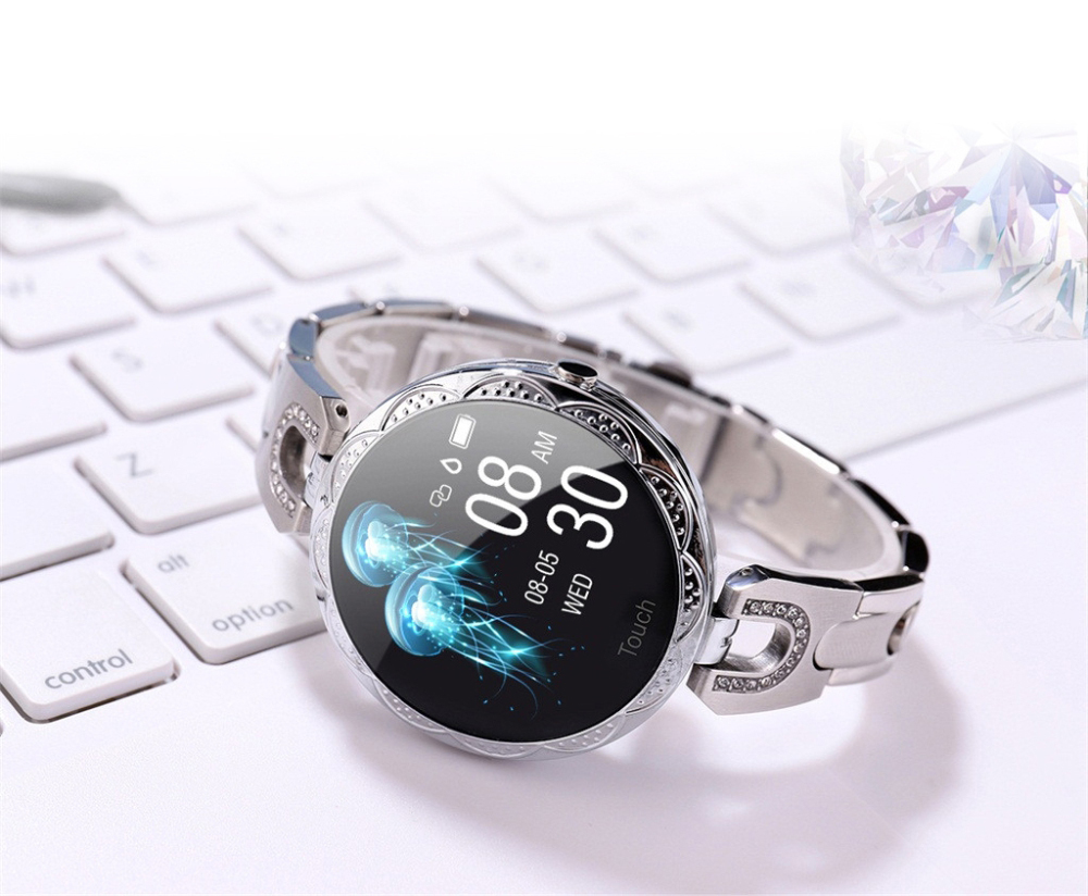 Ceas Smartwatch fashion Twinkler TKY-H5 cu functie de monitorizare ritm cardiac, Tensiune arteriala, Calitate somn, Notificari, Pedometru, Distanta parcursa, Incarcare magnetica, Argintiu